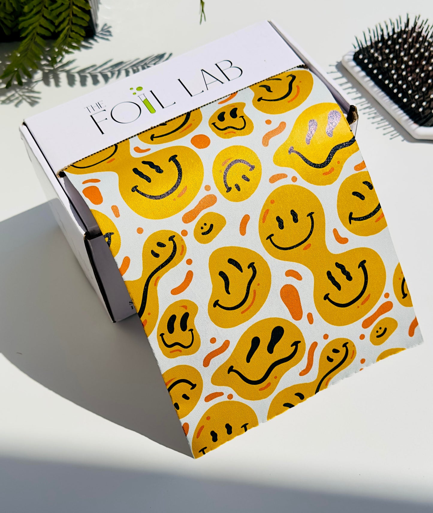 wild foil roll with yellow smiley faces 